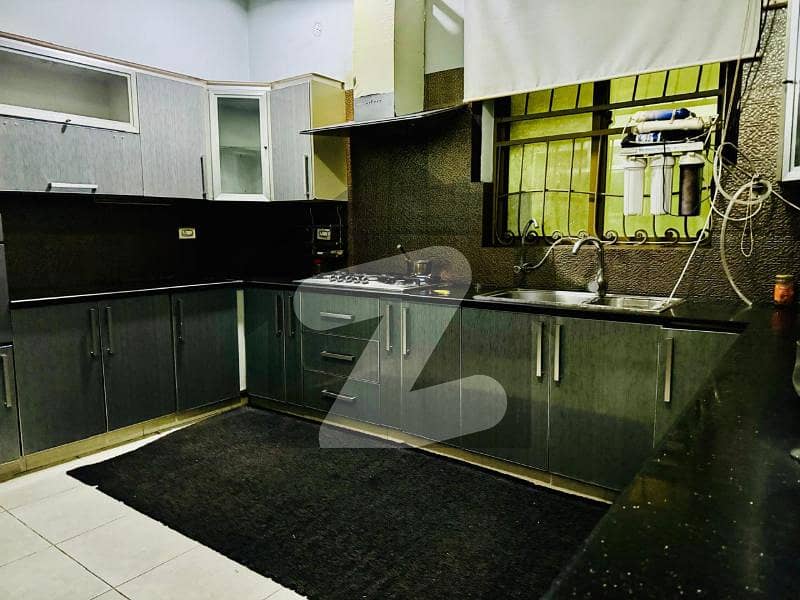 Ideal Family Living | 1 Kanal Portion Model Town Ideal Family Living | 1 Kanal Portion Model Town