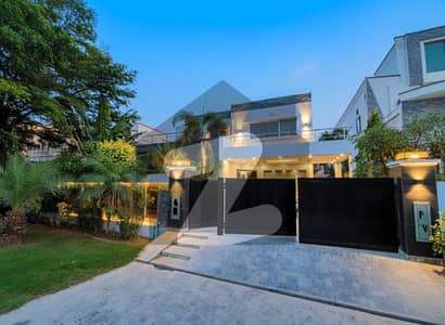 One Kanal Independent Modern Bungalow Premium Location Adjacent To The Sports Complex & Swimming Pool.