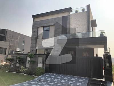 Spacious & Elegant 10-Marla Architectural Masterpiece Bungalow with Luxury Touch Finishing, 4 Master Bedrooms, TV Lounge, Dual Kitchens, Lush Lawn, Modern Design, Flawless Surroundings, 24/7 Security Prime DHA Phase 7 Block Y Fast & Easy Deal!