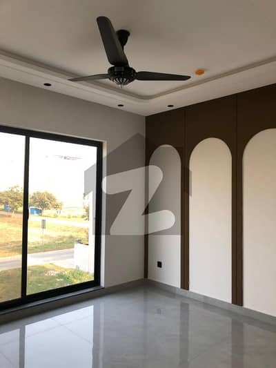 Mind-Blowing 5-Marla Brand New Designer House for Rent in DHA Phase 9-Town Block B 3 Master Beds, Company Kitchen, Lush Lawn, Prime Location, Only 130K!
