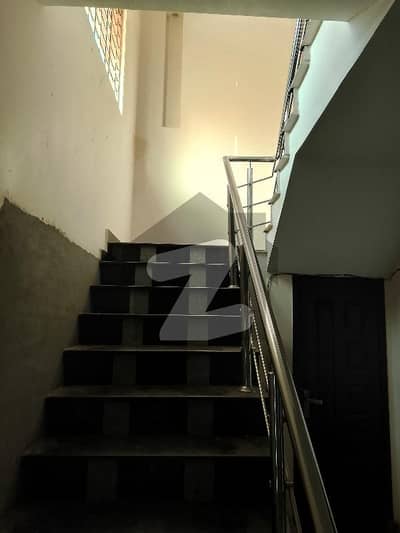 beautiful modern design 1kanal Uper portion available in Farmanite housing society