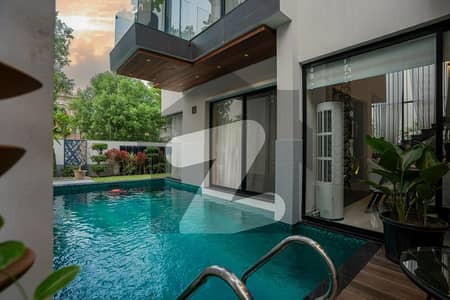 FACING PARK 25 MARLA MAZHAR DESIGN TOP OF THE LINE ULTRA MODERN FULLY FURNISHED VILLA WITH SWIMMING POOL ON GROUND FLOOR FOR SALE ON 70 FT ROAD IN DHA PHASE 5.