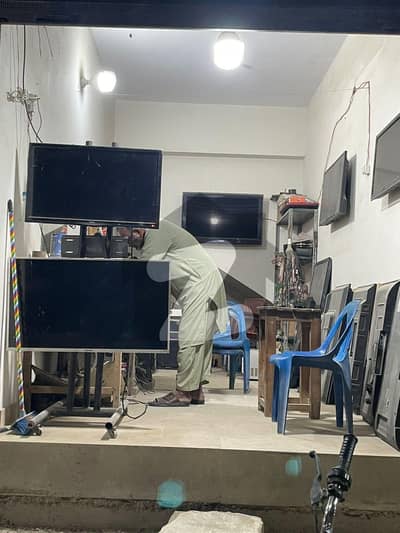 Shop for sell in block 9 prime location near to main road Shop for sell in block 9 prime location near to main road