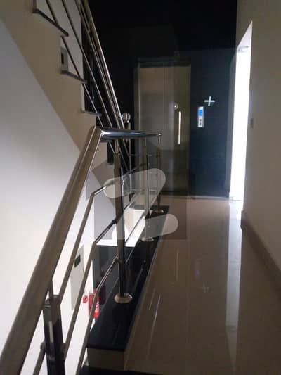 Dha ph3 block xx. 8 Marla brand new building with lift hot location dha business hub