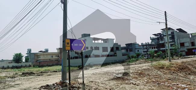 10 Marla Residential Plot Near Park on 60 Ft Road Near Market And Boulevard for Sale in Block M, LDA Avenue 1 Lahore Ideal Location Between Built Homes