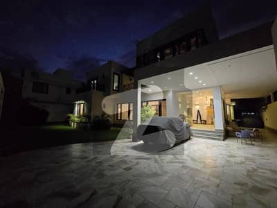 ڈی ایچ اے فیز 6 ڈی ایچ اے ڈیفینس,کراچی میں 6 کمروں کا 2 کنال مکان 27.0 کروڑ میں برائے فروخت۔