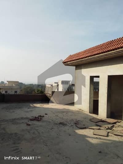 Taj Residencia main boulevard 10 Marla villa grey structure for sale.