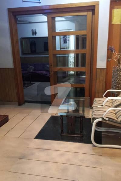 Well-Maintained 1 Kanal Double-Unit Bungalow for Sale Phase 3 Well-Maintained 1 Kanal Double-Unit Bungalow for Sale Phase 3