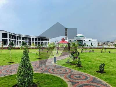 Sector Prism double kanal plot on best location back to main boulevard near access to northern bypass available for sale in DHA Peshawar