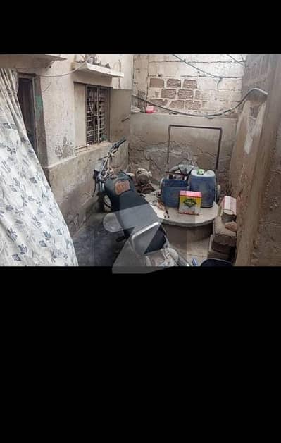 60 Gaz House for sale in chishti nager sector 11 1/2 orangi town near Alhuda Sheraton and Taj gasoline.   Electricity available 24 hrs Pani (water board + well) Leased Sui gas meter  Two rooms + Attach bath