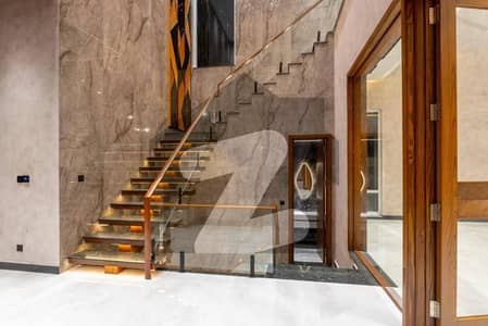 KANAL ULTRA MODREN HOUSE WITH BASMENT SEMI FURNISHED AND 25 KV SOLAR FOR SALE IN DHA 5