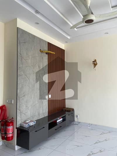 5 Marla Brand New Modern Design Lavish House For Sale In DHA | For Discounted Price And Original Pictures Download The App "Signature Lands".