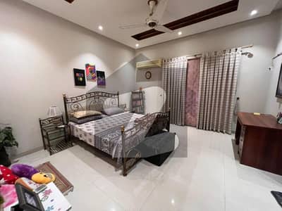 MODERN DESIGN 20 MARLA ELEGANT AND FULLY MAINTAINED SUPER HOT LOCATED BUNGALOW IS AVAILABLE IN THE BEST BLOCK OF DHA LAHORE.