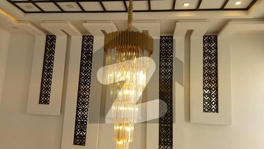 DHA Phase 6 1-Kanal Elegant Home 5 Luxurious Beds, 2 Company Kitchens, Wide Drawing & Dining Area, Heart-Touching Surroundings, 24/7 Security!