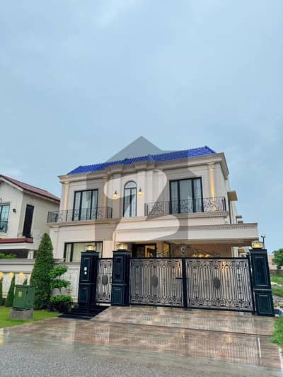 Spacious 1-Kanal Semi-Furnished Masterpiece Bungalow in DHA Phase 6 Lahore 5-Master Bedrooms, Wide Drawing & Dining, Modern Architectural Elegance, Easy Deal With Buttar Real Estate