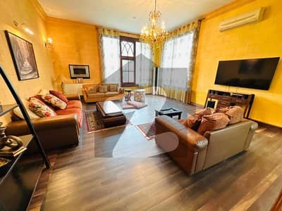 Beautiful Luxury House Available For Rent In F-8 Islamabad. 5 Bedrooms 2 Servant Room Big Garden 6/7 Cars Parking VIP Location