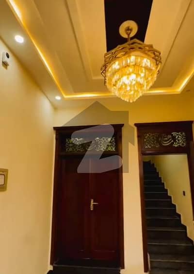 Faisal Town F18 . House New Size 5 Marlah 25*50.6 bed attach bath Good location. C . block