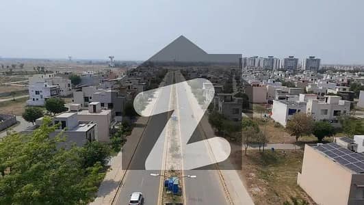 With cost of land 5 Marla Top Location Plot No- 2144 Block B Phase 9 Town DHA Lahore For Urgent Sale