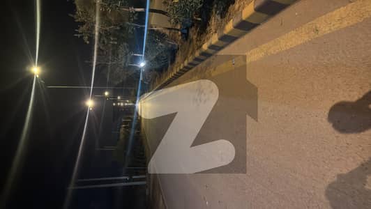 5 Marla , Second to corner , service road touch plot om 12 meter road , No poles , no depression