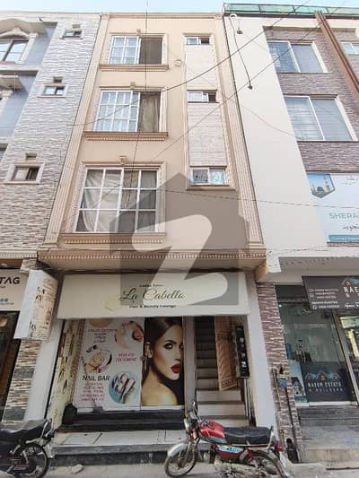 High-Yield 2-Marla Commercial Plaza 4 Apartments, 1 Shop Punjab Society, Near DHA Guaranteed Rental Income:* PKR 125,000/month