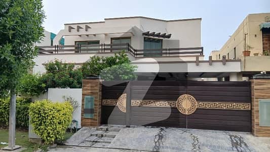 One Kanal Slightly Used Ultra Modern Designer Owner Build Fully Furnished Bungalow For Sale At Prime Location Of DHA Lahore Near To Park Masjid & Commercial Market.