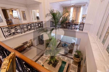 Premium Fully Furnished 2-Kanal Bungalow in DHA Phase 6 Grand Curb Appeal, Open Layout, Luxury Interiors, Dining & Drawing Rooms, 7 Master Bedrooms PKR 40 Crore