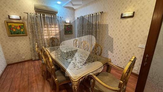 Fully Furnished 1 Kanal House in DHA Phase 5, B Block 5 Bedrooms with Attached Baths, Company Kitchens, 2 Servant Quarters, Lush Lawn & Wide Parking Ready to Move, Slightly Used, Negotiable by Z-Team Construction Pvt Ltd