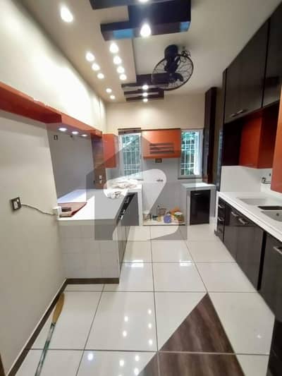 FLAT FOR SALE SAVANA CITY KDA LEASE BANK LOAN AVAILABLE (4BED ROOM ATTACHED BATH ROOM SEPRATE DRAWING ROOM ONE BIG LOUNGE ONE KITCHEN) BOUNDARIES WALL CAR PARKING SECURITY GUARDS NEARLY MARKET MAIN ROAD BLOCK 13D2 GULSHAN E IQBAL !!/ NO BROKER