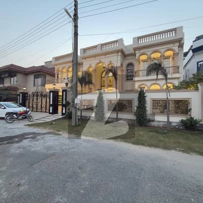 Ultra-Modern 5-Bedroom Luxury Mansion for Sale Valencia Town, Lahore The Ultimate Address in South Lahore Experience the pinnacle of luxury living in this brand-new, architecturally designed 1-Kanal bungalow. Situated on a wide 40-foot road, this property combines sophisticated design with the serene lifestyle that Valencia Town is famous for.  Property Specifications: Size: 1 Kanal Bedrooms: 5 Master Bedrooms with walk-in closets.  Bathrooms: 6 Designer Bathrooms