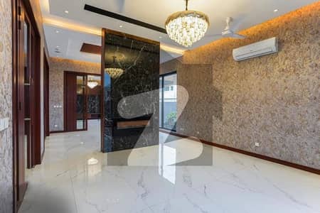 A Statement Home in a Prestigious DHA Neighborhood Luxurious 1-Kanal Bungalow Offering Spacious Bedrooms, Entertainment-Focused TV Lounges & Family-Friendly Design