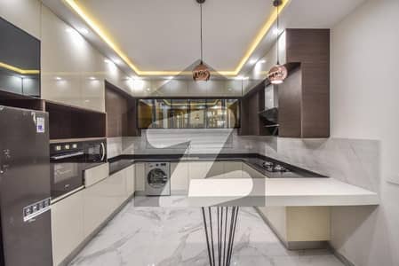 Well-Maintained, Cheap Price 1-Kanal Dream Home in DHA Phase 6 Block K Ideal for Family Living with Lush Lawn, Drawing Dining & Wide Access Roads