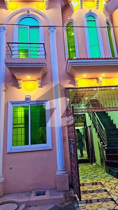 3 Marla double story house fr sale brand new home ideal and hot loction carpet road water electricity available 3D ultra model design Spanish look furnished home with wood work gated society 24 hour security guard near sozo water park near canal road