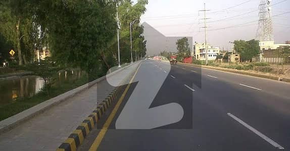 6 Marla Commercial plot available for sale in East Canal Road nearest to Ibrahim Villas.