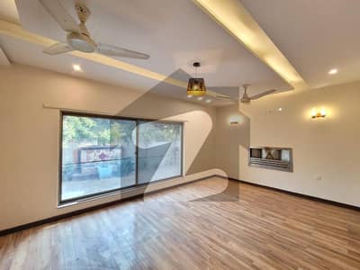 Stunning 1-Kanal Premium House for Rent in DHA Phase 5 5 Master Beds, 2 TV Lounges & Lush Lawn, Ideal Family Living, Reasonable Rent 325K (Negotiable)