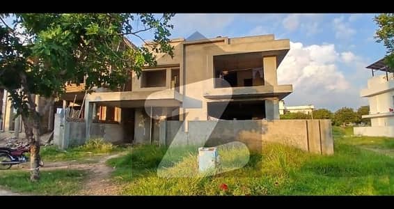 1 Kanal Main Road House Grey Structure Available in E Block Gulberg Greens Islamabad