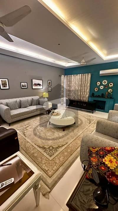 One Kanal Slightly Used Ultra Modern Designer Owner Build Fully Furnished Bungalow 15KV Solar Attached For Sale At Prime Location Of DHA Lahore Near To Park Masjid & Commercial Market