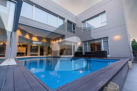22 MARLA ULTRA MODERN LUXURY BUNGALOW WITH OUTDOOR SWIMMING POOL FOR SALE IN DHA PHASE 7 NEAR TO RAYA.
