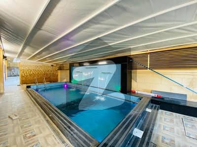 Beautiful Luxury Brand New Front-Open House For Sale In F-10/2 VIP Location 5 Bedrooms And Swimming Pool.