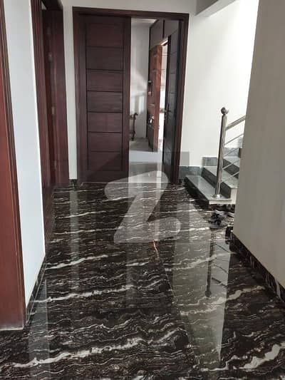 P-4 Villa. In Bahria Town . 500 Sq Yards One Unit House . 5 Bedrooms . 2 Kitchen. 2 Lounges, Drawing Room And Dining Room. 2 Stores Beautiful Green Lawn . 10 K. V. A. Solar On-Gride. Marble On The Roof Top. West Open. Near Park. Call Direct Owner