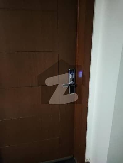 "Available for sale, this luxurious 2-bedroom apartment is located on the Main Boulevard of Gulberg Greens, Islamabad. Featuring a stunning boulevard view, the apartment is fully furnished and includes a state-of-the-art lift. It offers 24/7 security, modern amenities, and a family-friendly environment. Enjoy comfort and convenience in this prime location. "