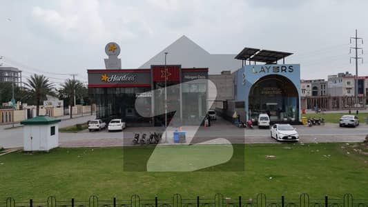 Dont miss this opportunity! A 2.20 Marla unit in Green Avenue, Canal Road, Faisalabad, offering convenience, security, and a prime location.