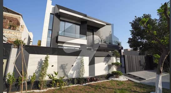 One Kanal Brand New Luxury Ultra-Modern Design Most Beautiful Fully Furnished Bungalow 2 Servant Quarter In Basement For Sale At Prime Location Of DHA Lahore Near To Park Masjid & Commercial Market.