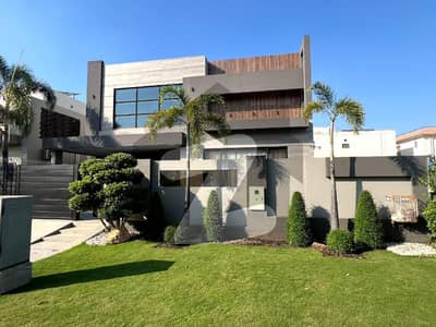 One Kanal Brand New Luxury Ultra-Modern Design Most Beautiful Fully Furnished Bungalow 2 Servant Quarter In Basement For Sale At Prime Location Of DHA Lahore Near To Park Masjid & Commercial Market.