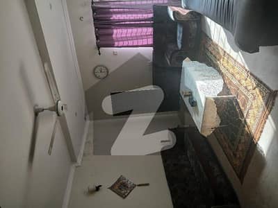 Rooms and bedspaces are available for executive bachelors on rent.