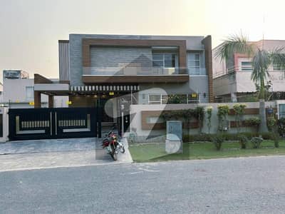 One Kanal Slightly Used Luxury Ultra-Modern Design Most Beautiful Bungalow 2 Servant Quarter In Basement For Sale At Prime Location Of DHA Lahore Near To Park Masjid & Commercial Market.