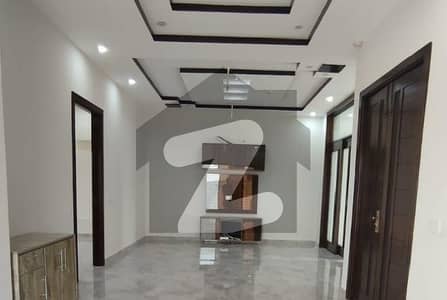 A Masterpiece Of Material & Design Modern 10 Marla Home With Two Company Kitchens & Premium Flooring In DHA Phase 5