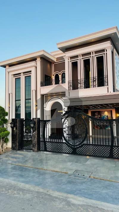 SEMI FURNISHED 1 KANAL ELEGANT AND FULLY MAINTAINED SUPER HOT LOCATED BUNGALOW IS AVAILABLE IN THE BEST BLOCK OF DHA LAHORE.