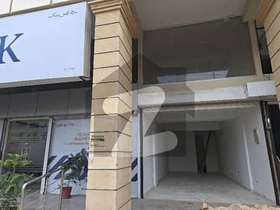 KING LUXURY MAIN SHAHED E MILAT ROAD SHOP FOR SALE WITH RENTAL 2.6 LACS INXOME GROUND PLUS MAZANINE 372 SQ FEET GROUND AND 372 SQ FWET MAZANINE