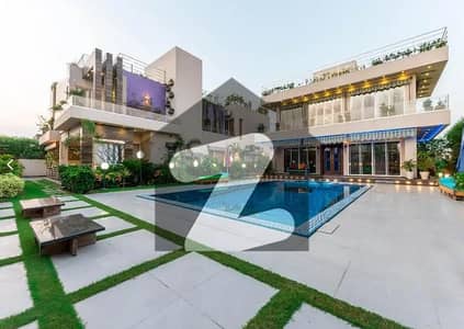 1 KANAL MAZHAR DESIGN FULL BASEMENT FULLY FURNISHED ULTRA MODERN BUNGALOW WITH OUTDOOR SWIMMING POOL,HOME CENIMA AND ROOF TOP PLUS 1 KANAL LAWN SPACE FOR SALE IN DHA PHASE 6 NEAR TO RAYA.