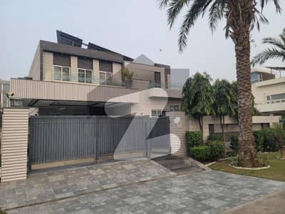 One Kanal Slightly Used Ultra Modern Designer Owner Build Fully Furnished Bungalow 2 Servant Quarter In Basement For Sale At Prime Location Of DHA Lahore Near To Park Masjid & Commercial Market.